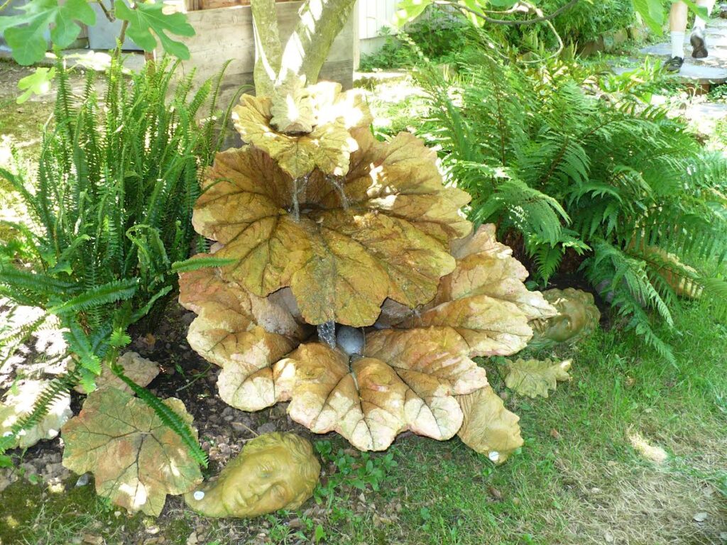 fountain with giant leaves