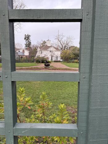 Workshop seen through grid trellis