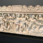 Sarcophagus with elaborate carving of mythical figures at Getty Villa