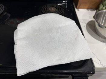 Sandwich herbs in paper towels to dry. Dry Herbs in the Microwave