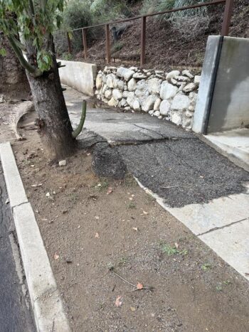 Asphalt repair of a sidewalk