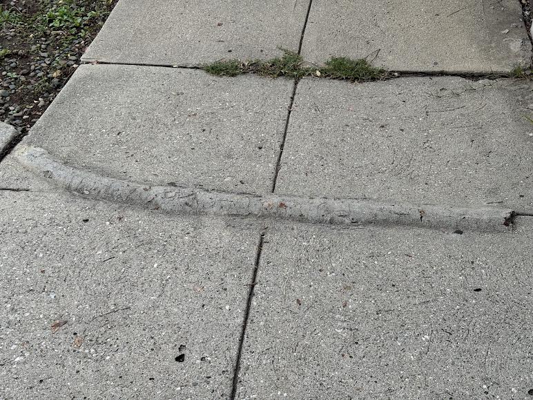tripping point in sidewalk