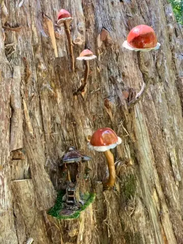 Mini Ceramic Mushrooms in the model train area at Cheekwood