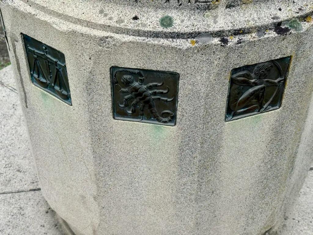 Signs of the Zodiac on a sundial column at Manito Park in Spokane, WA