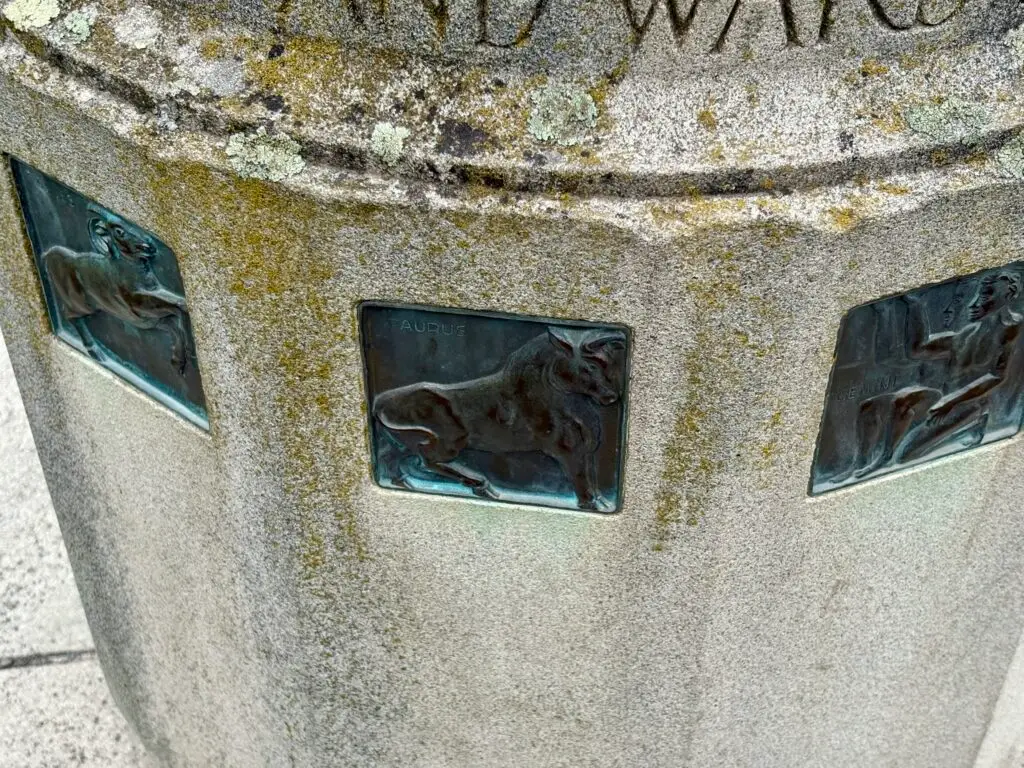 Zodiac Symbols on a Sundial Column