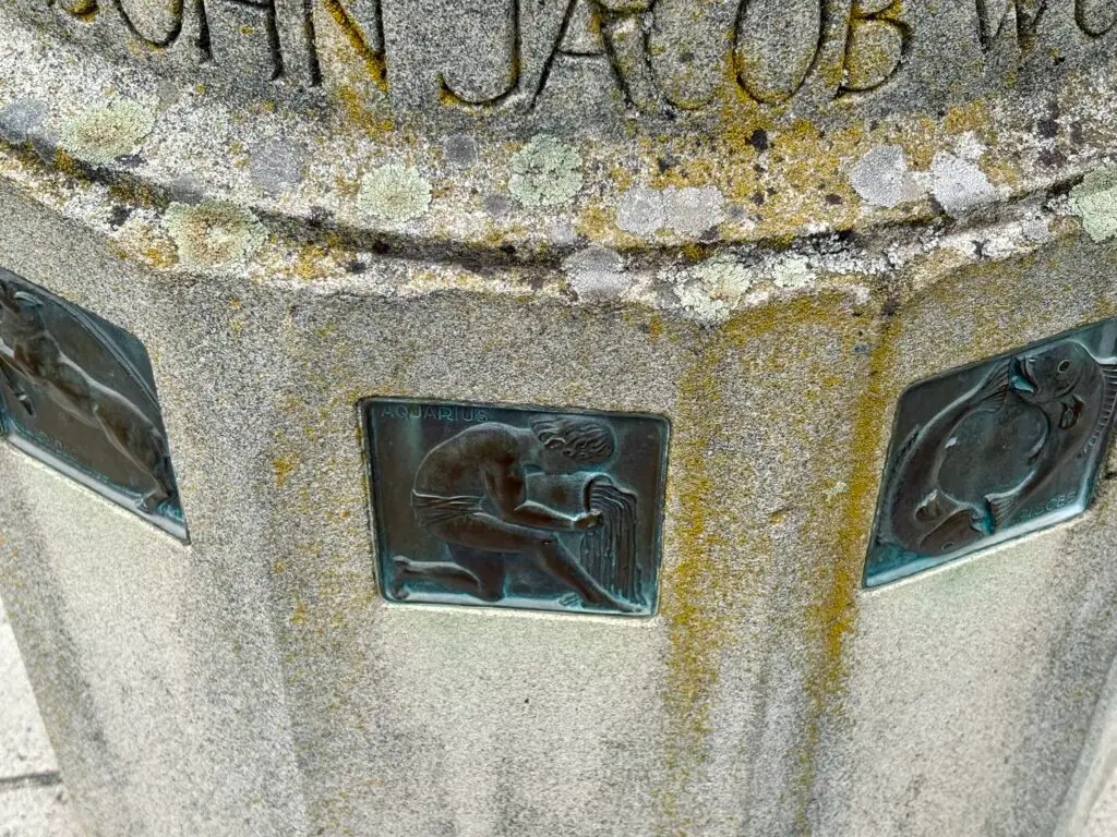 Signs of the Zodiac on a sundial column at Manito Park in Spokane, WA
