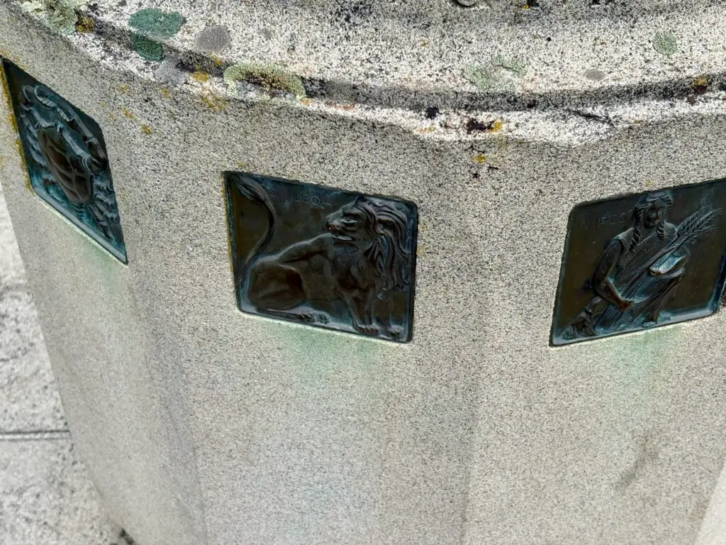 Signs of the Zodiac on a sundial column at Manito Park in Spokane, WA